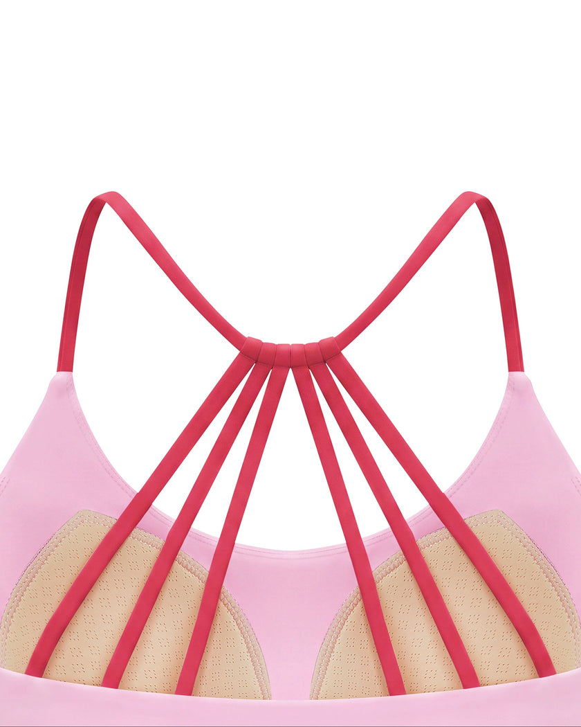 TrackLine Synergy Strappy Sports Bra in Pink with Rose Red, close-up of contrast multi-strap back