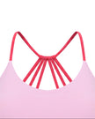 TrackLine Synergy Strappy Sports Bra in Pink with Rose Red, close-up of U-neck front