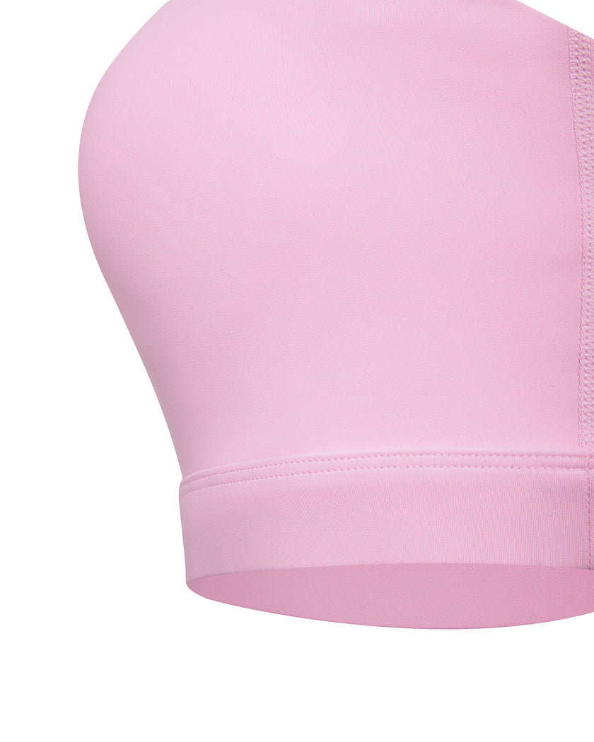 TrackLine Synergy Strappy Sports Bra in Pink with Rose Red, close-up of supportive underbust band