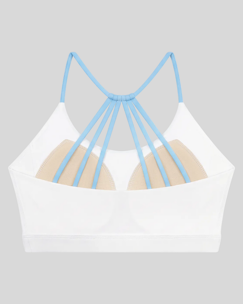 TrackLine Synergy Strappy Sports Bra in White with Sky Blue, flat lay back view showing multi-strap design