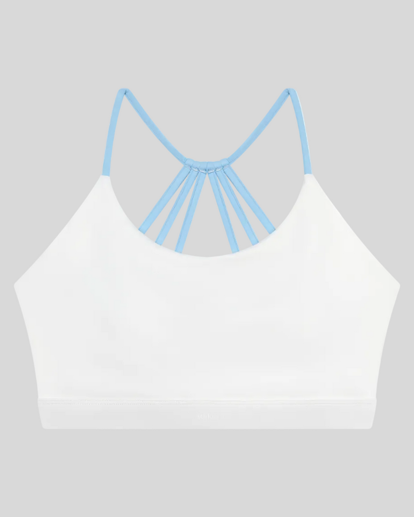 TrackLine Synergy Strappy Sports Bra in White with Sky Blue, flat lay front view