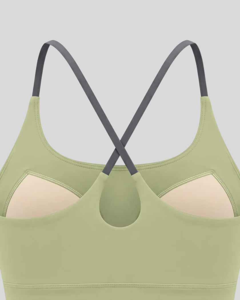 Close-up of Dark Gray crossover back straps on TrackLine Synergy Tank Top in Bean Green