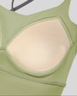 Interior cup lining detail of TrackLine Synergy Tank Top in Bean Green