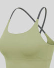 Angled close-up of TrackLine Synergy Tank Top in Bean Green with Dark Gray strap detail