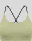 Close-up of U-neckline on TrackLine Synergy Tank Top in Bean Green