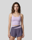 Woman wearing TrackLine Synergy Tank Top in Light Purple with Deep Purple straps, front view