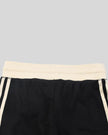 Back waistband detail closeup of the Athlesi TrackLine Track Shorts in black