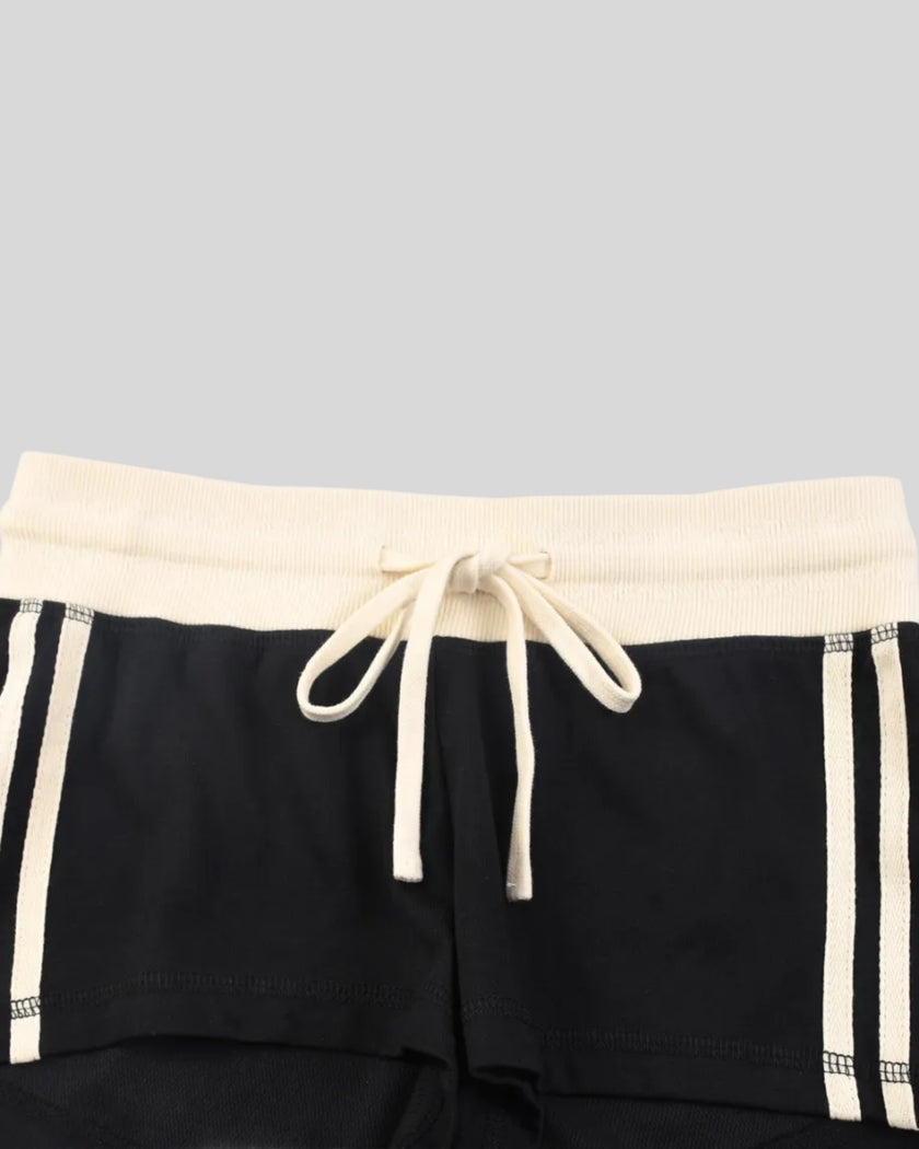 Front waistband closeup of the Athlesi TrackLine Track Shorts in black