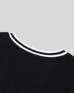 Back collar closeup of the Athlesi TrackLine V-Neck Crop Tee in black