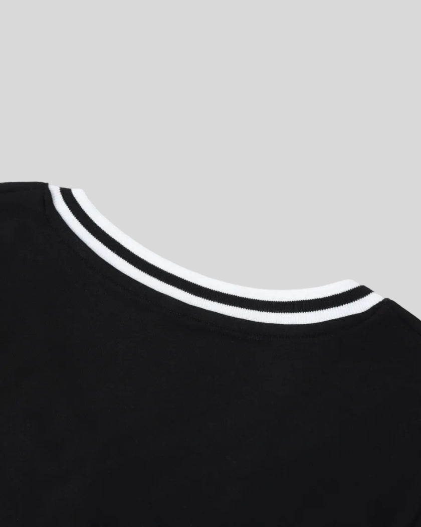 Back collar closeup of the Athlesi TrackLine V-Neck Crop Tee in black