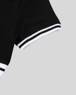 Closeup of the striped short sleeve hem detail on the Athlesi TrackLine V-Neck Crop Tee in black