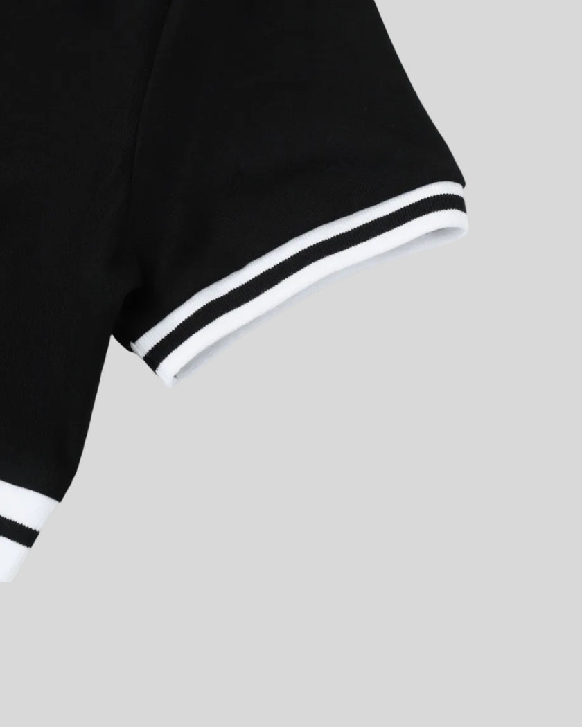 Closeup of the striped short sleeve hem detail on the Athlesi TrackLine V-Neck Crop Tee in black