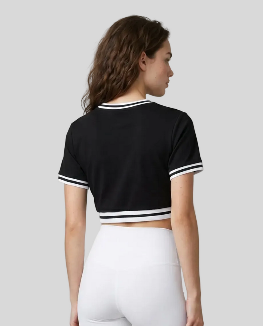 Upper body back view of the Athlesi TrackLine V-Neck Crop Tee in black