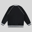 TrackLine Varsity Jacket in Black back view with raglan sleeve construction