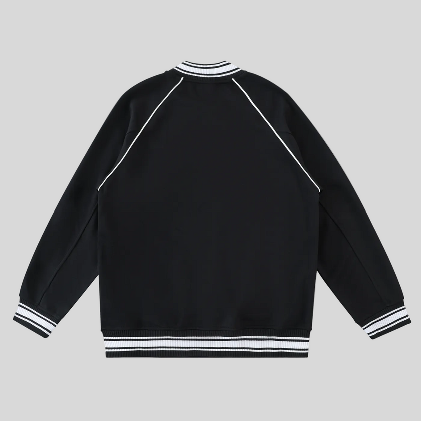 TrackLine Varsity Jacket in Black back view with raglan sleeve construction