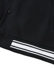 Striped rib hem detail on the TrackLine Varsity Jacket in Black