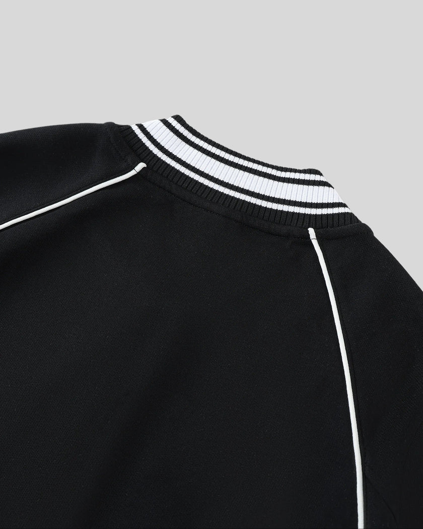 Back collar detail on the TrackLine Varsity Jacket in Black
