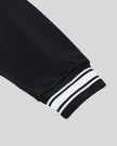 Sleeve detail on the TrackLine Varsity Jacket in Black