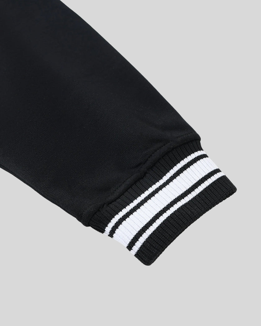 Sleeve detail on the TrackLine Varsity Jacket in Black