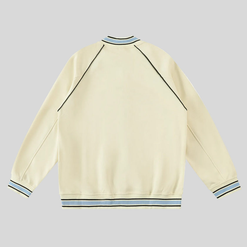 TrackLine Varsity Jacket in Mild Apricot back view with raglan sleeve construction