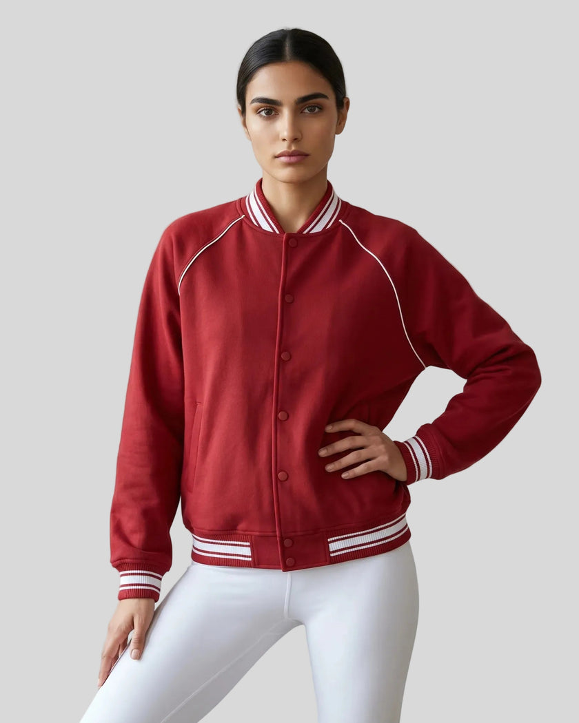 Model wearing the TrackLine Varsity Jacket in Red fully buttoned front view