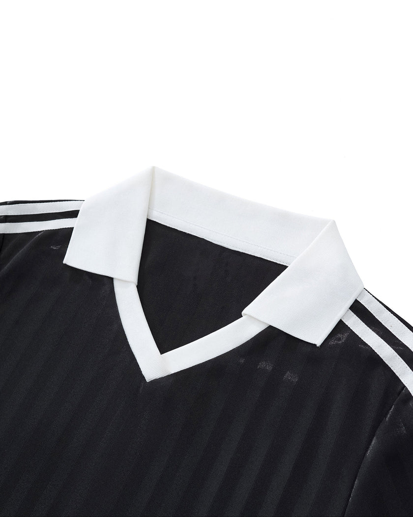 Back collar detail closeup of the Athlesi TrackLine Varsity Jersey in black and white