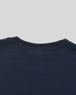 Back collar closeup of the Athlesi TrackLine Varsity Tee in blue