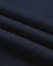 Closeup of the breathable cotton-modal fabric texture on the Athlesi TrackLine Varsity Tee in blue