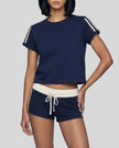 Front angled view of the Athlesi TrackLine Varsity Tee in blue with varsity stripe sleeve detailing