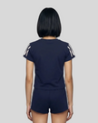 Upper body back view of the Athlesi TrackLine Varsity Tee in blue