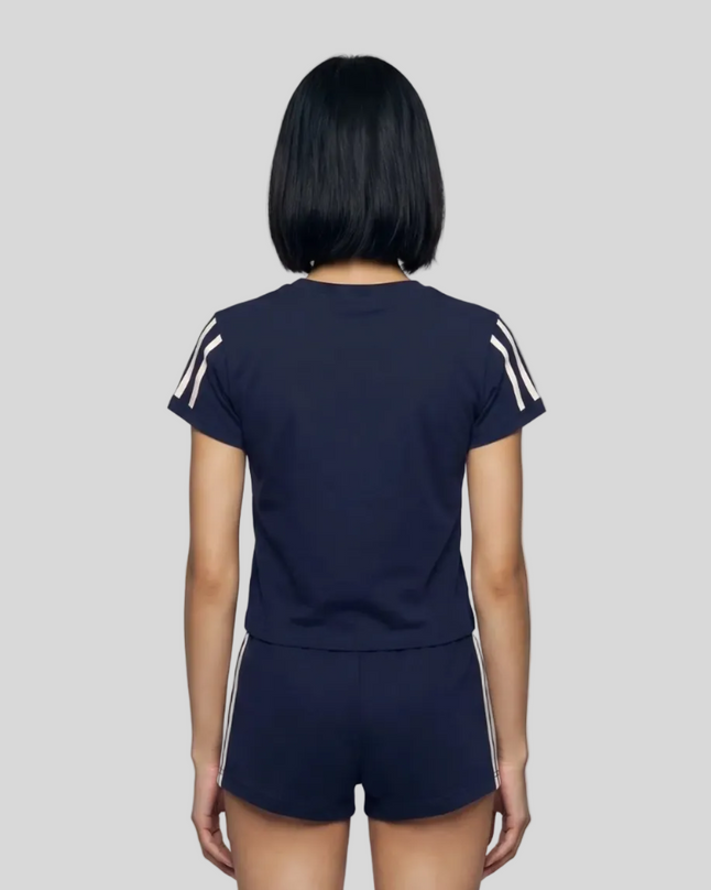 Upper body back view of the Athlesi TrackLine Varsity Tee in blue