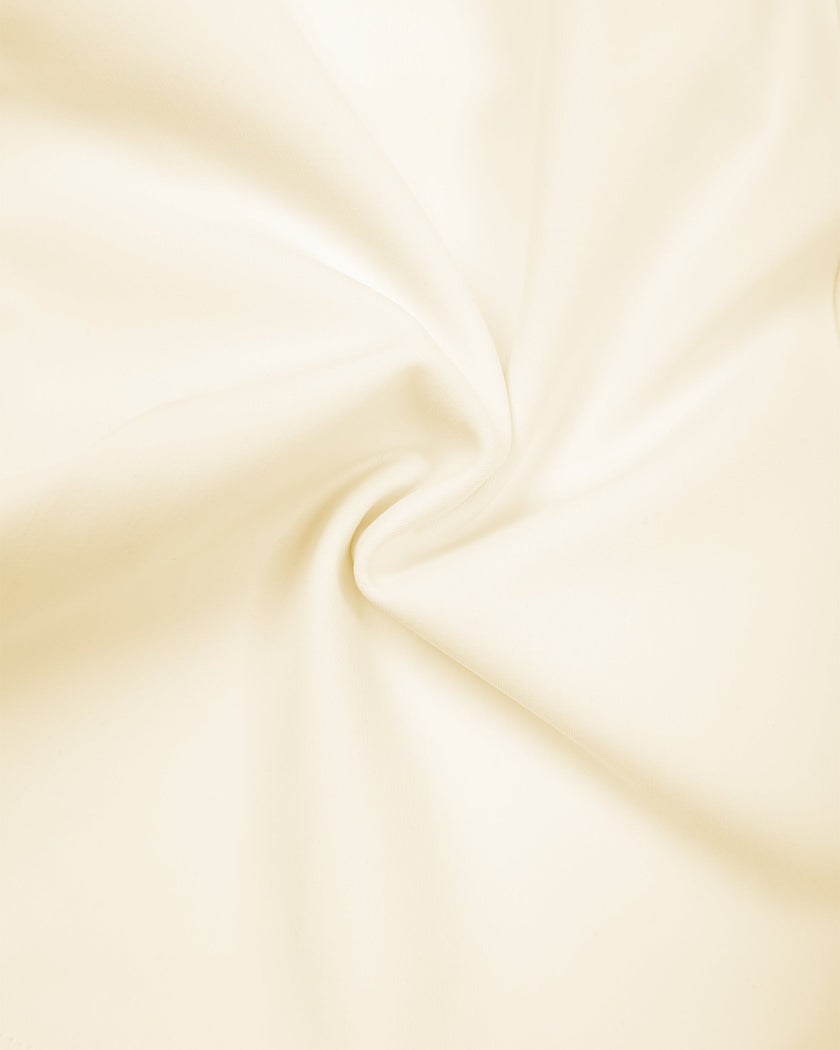 Detailed view of stretch fabric and contrast stitching on TrackLine Yoga Shorts in apricot
