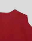 Back collar closeup of the Athlesi TrackLine Zip Crop Tee in red