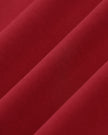 Closeup of the soft stretch fabric texture on the Athlesi TrackLine Zip Crop Tee in red