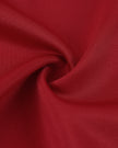 Detailed fabric texture closeup of the Athlesi TrackLine Zip Crop Tee in red