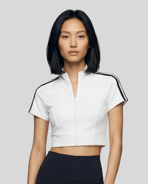 Upper body front view of the Athlesi TrackLine Zip Crop Tee in white with contrast stripe sleeve details