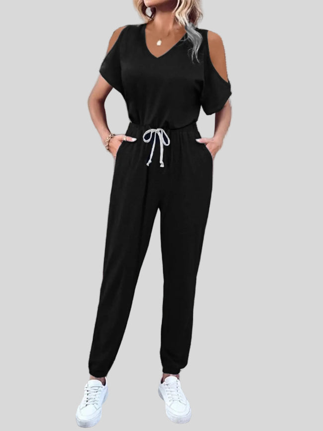 Black cold-shoulder jumpsuit with V-neck and tie waist, front view