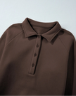 Close-up of collar detail on UrbanEase Collared Sweatshirt in Brown