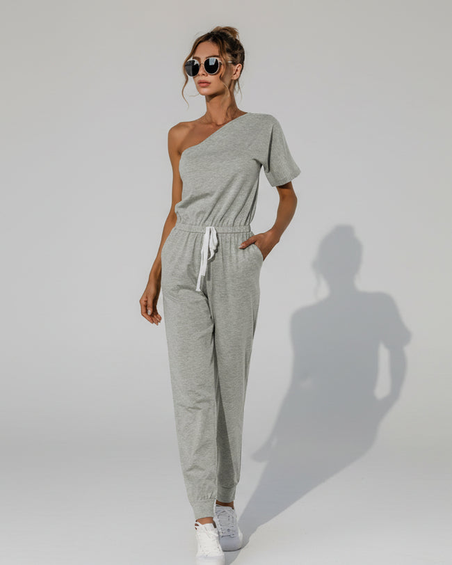 Gray one-shoulder street-style jumpsuit with relaxed fit, front view