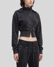 Upper body side view of woman wearing Vintage Washed Edition Hoodie in Black
