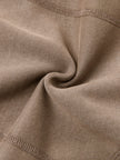 Closeup of vintage washed Coffee fabric texture and stitching on Vintage Washed Edition Hoodie