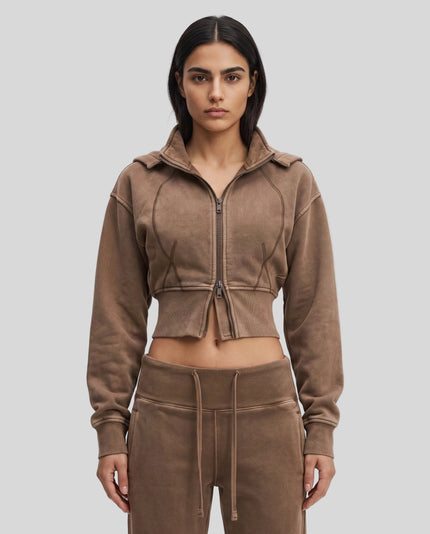 Upper body front view of woman wearing Vintage Washed Edition Hoodie in Coffee