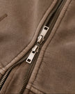 Closeup of metal two-way zipper and vintage washed fabric on Vintage Washed Edition Hoodie