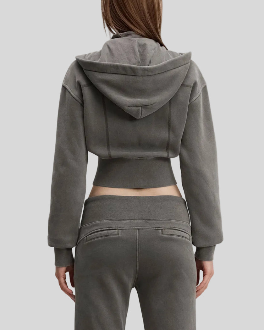 Mid body back view of woman wearing Vintage Washed Edition Hoodie with detachable hood in Dark Gray