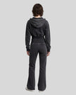 Full body back view of woman styling Vintage Washed Edition Hoodie and matching Pants in Black