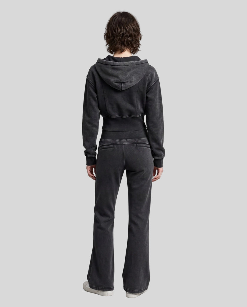 Full body back view of woman styling Vintage Washed Edition Hoodie and matching Pants in Black