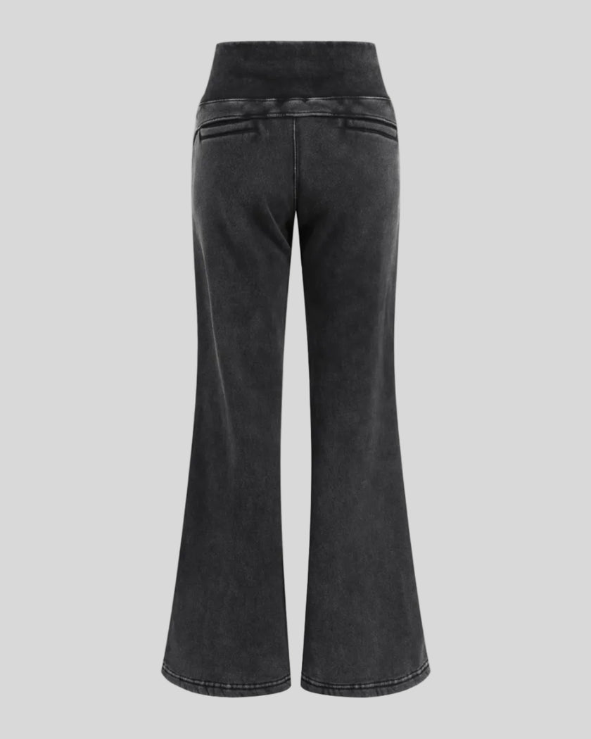 Back view of Vintage Washed Edition Pants in Black with flared legs and rear pocket details