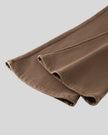 Closeup of flared leg opening and stitched hem on Vintage Washed Edition Pants in Coffee