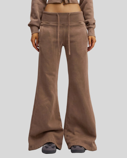 Lower body front view of woman wearing Vintage Washed Edition Pants in Coffee, showing flared leg silhouette