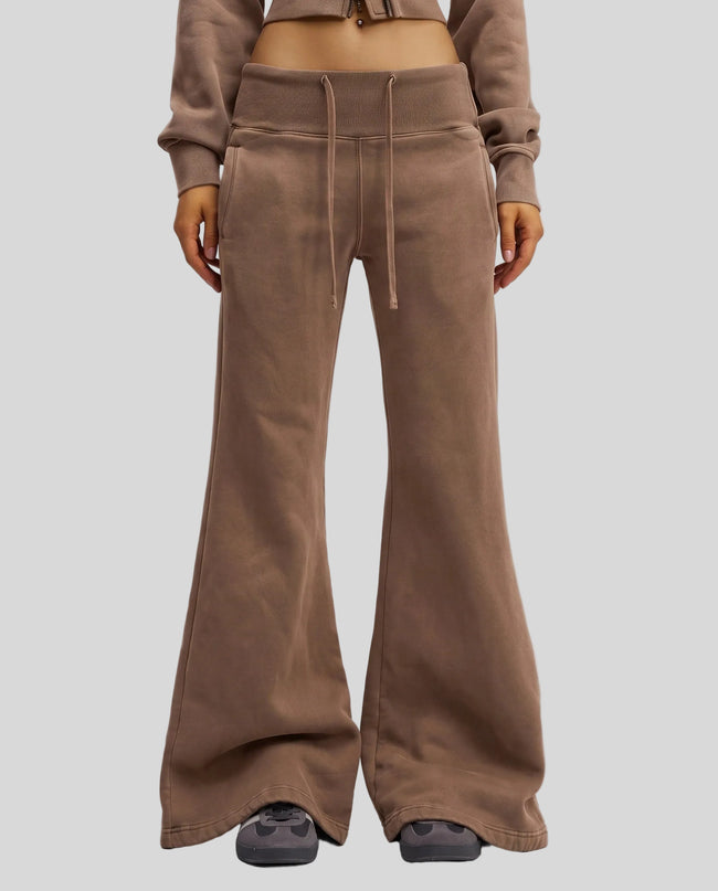Lower body front view of woman wearing Vintage Washed Edition Pants in Coffee, showing flared leg silhouette